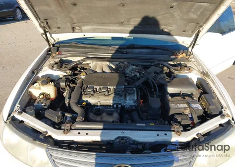 2002 Toyota Camry Solara Sle V6 z USA, uszkodzony, nr VIN 2T1CF28P82C547194